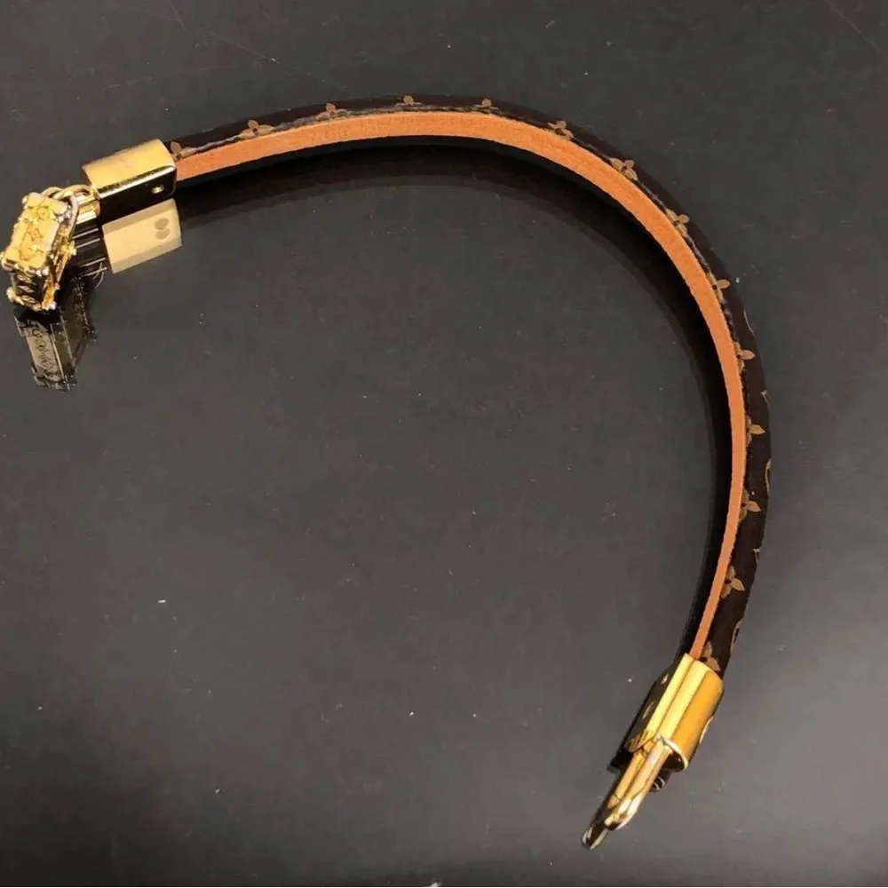 Louis Vuitton luxury bracelet with adorable luggage charm!! - Picture 11 of 11